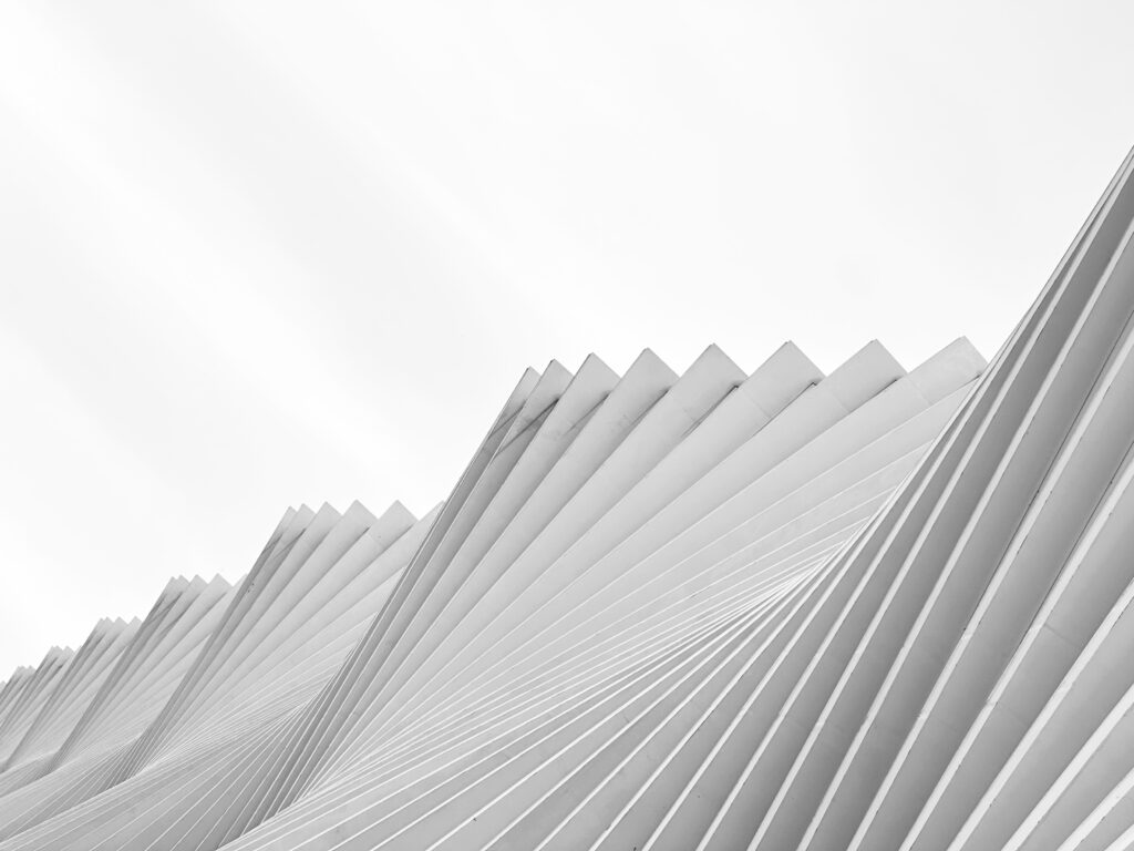 Porzioni B/N series by Sofia Dell'Aversano Orabona: a wave of white pleated architectural fins